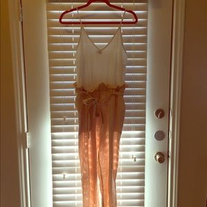 White and coral beachy jumpsuit.